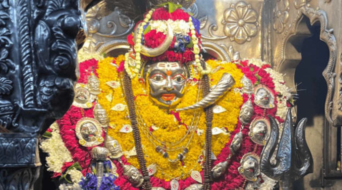 Sacred entrance and brass bells of Shri Kaal Bhairav Temple in Varanasi