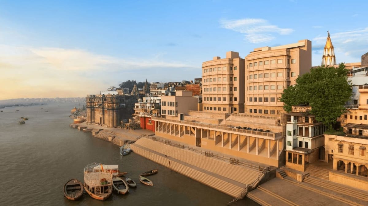 Riverfront hotel and historic ghats in Varanasi along the Ganges