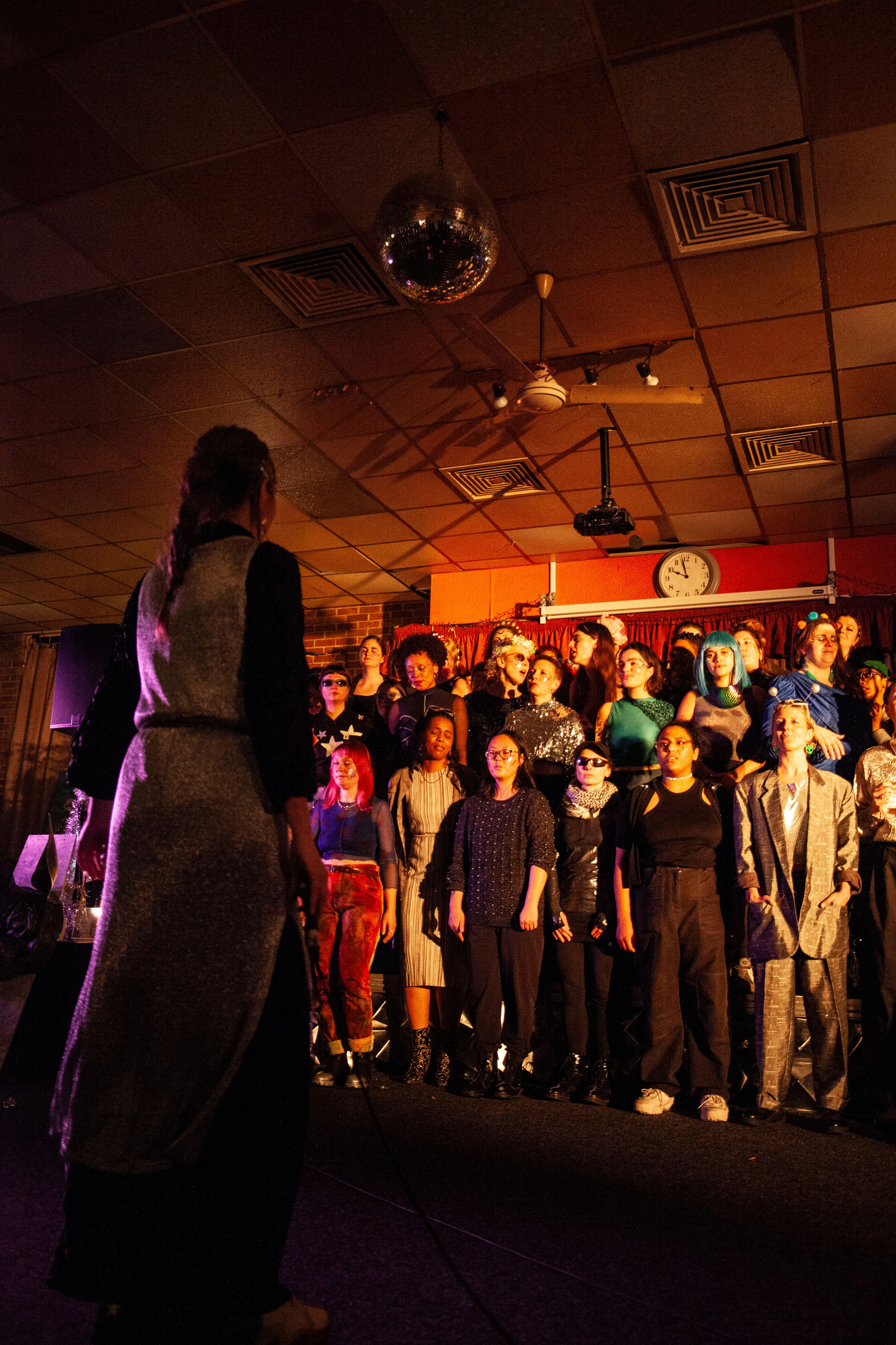 Jenny M standing in front of the choir