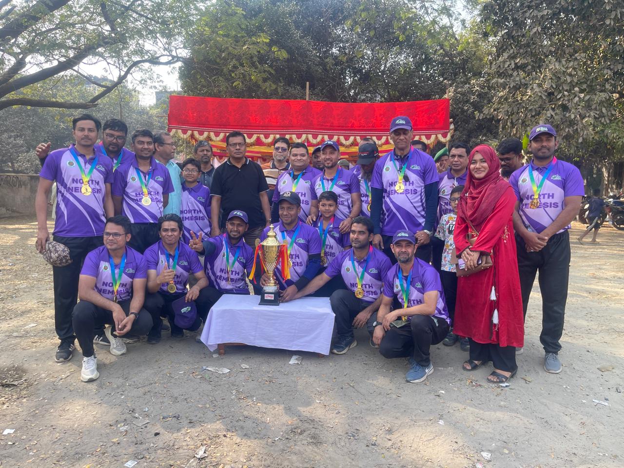 North Nemesis with the championship trophy and winners' medals