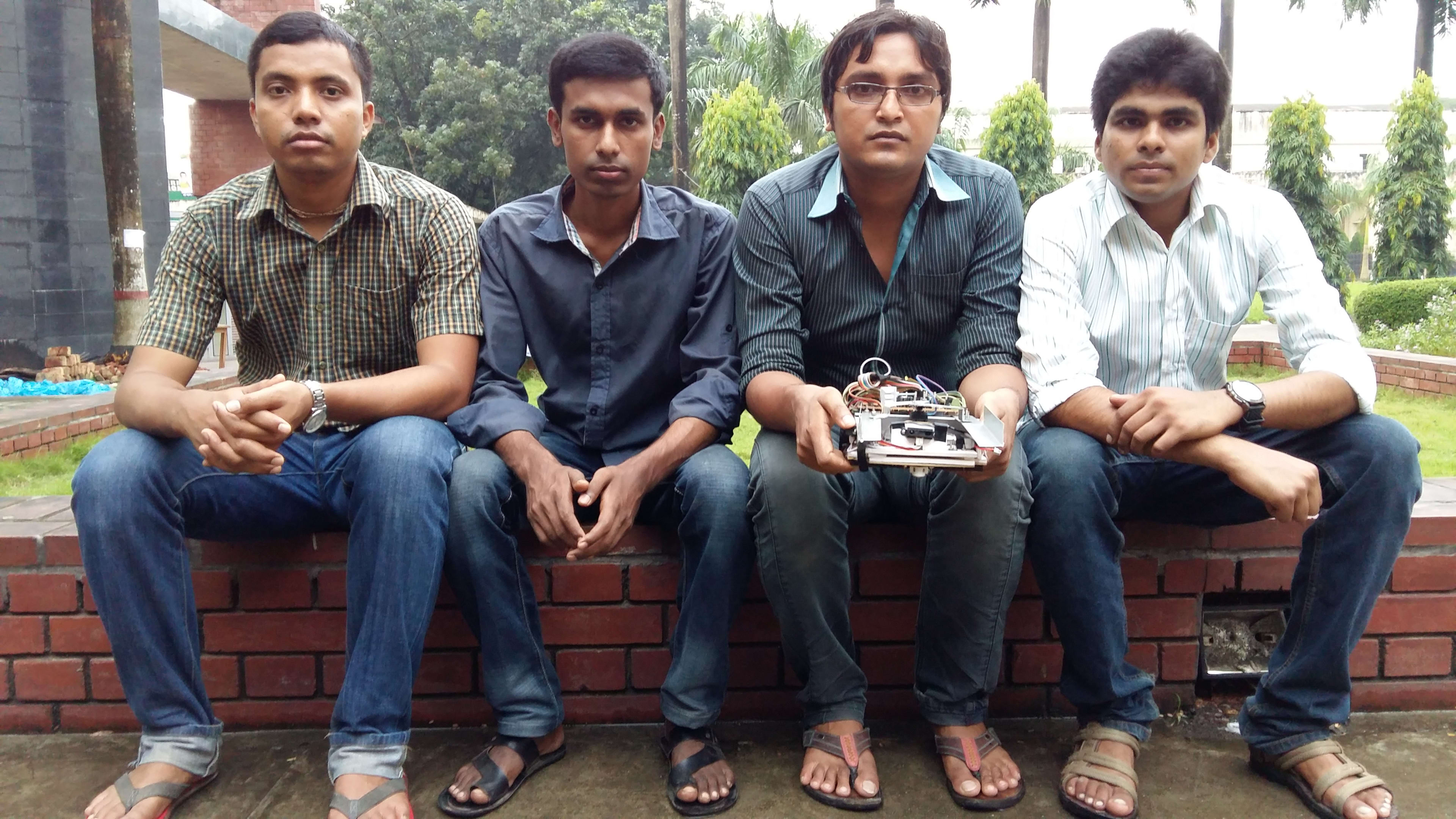 Team Robo Express with our line follower robot on the DUET campus