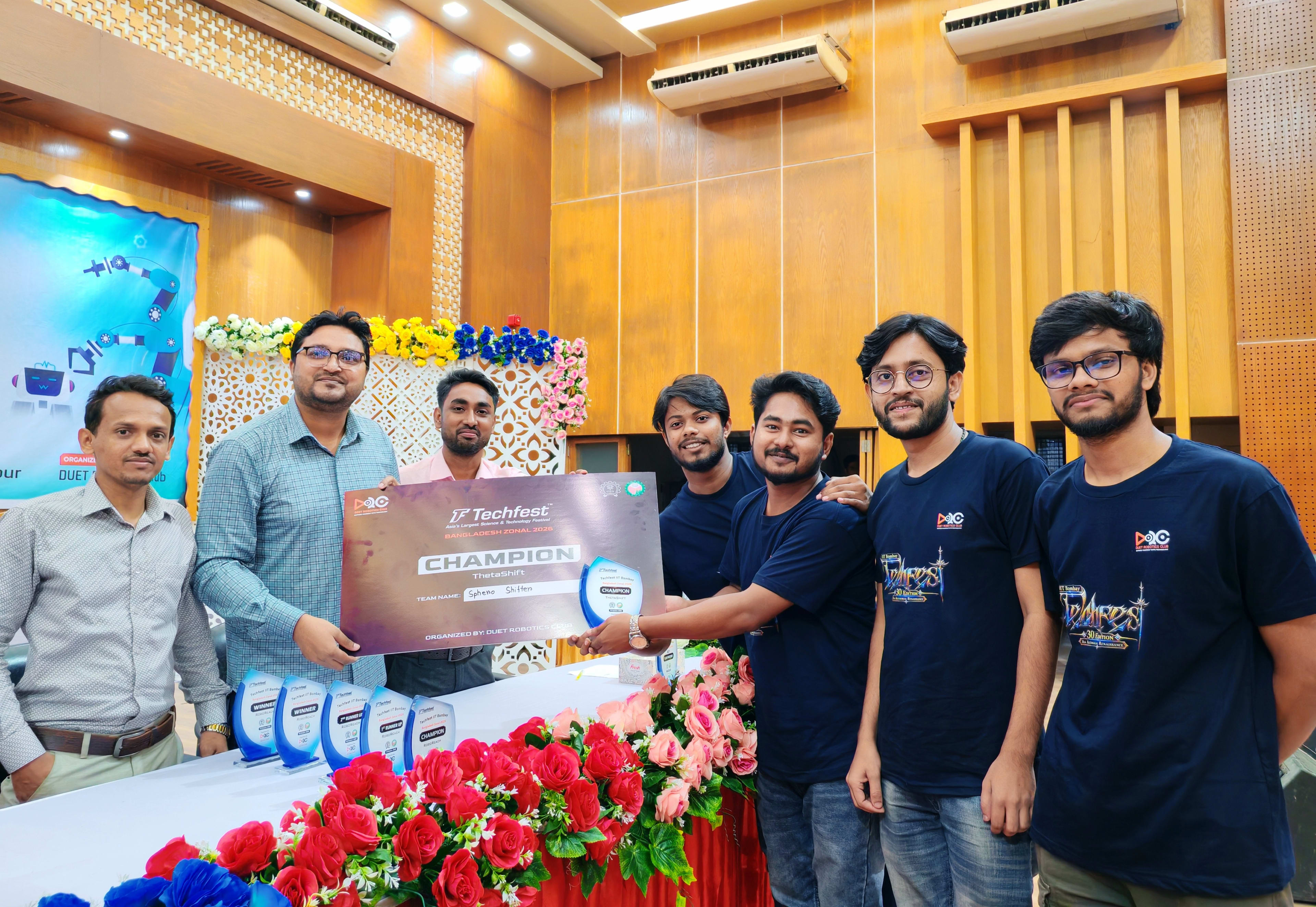 Presenting the Champion award to a winning team at Techfest Bangladesh Zonal 2026