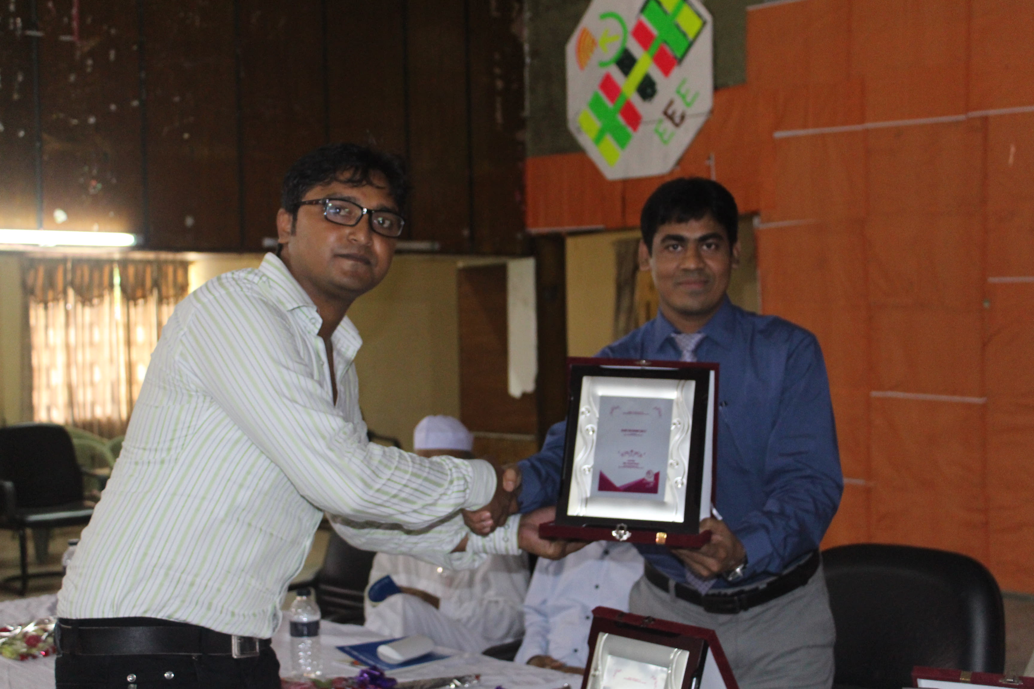 Receiving a crest of honour from Prof. Dr. Md. Raju Ahmed, Head of the Department of EEE, DUET, in recognition of my role as Convener of DUET TECHFEST 2017