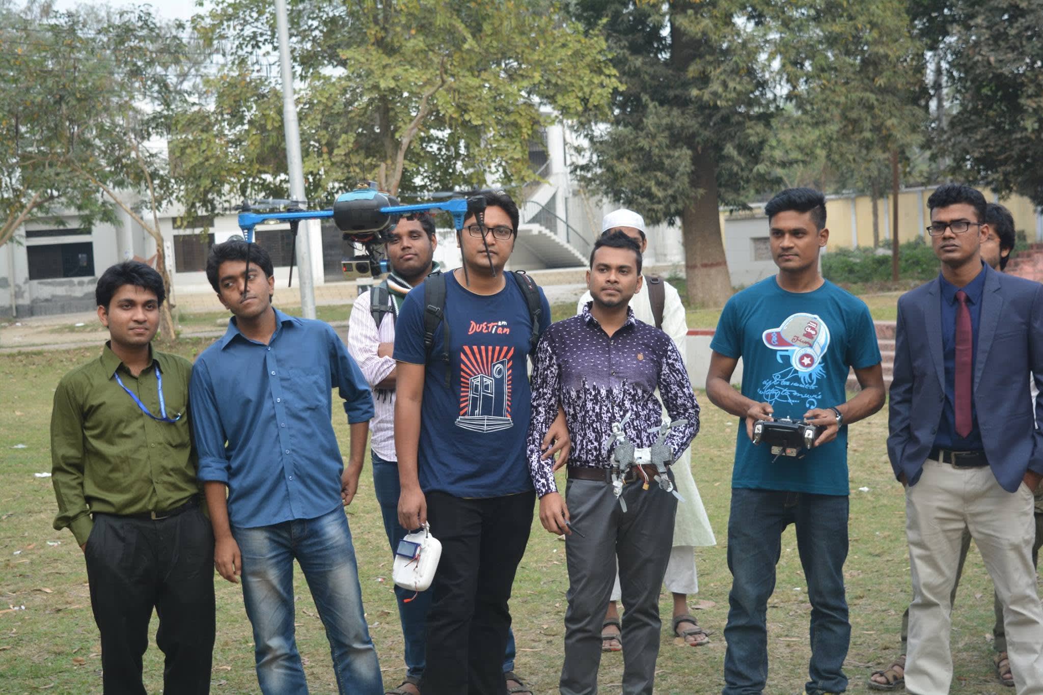 An outdoor flight demonstration on the RUET campus with participants