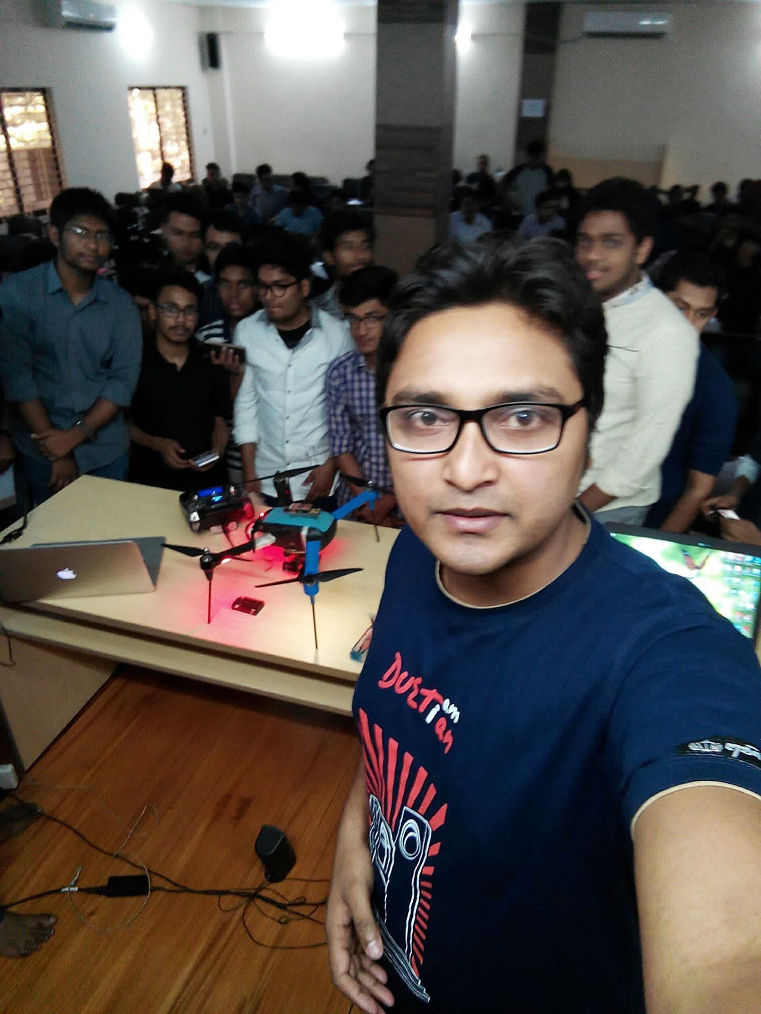 With participants gathered around the drone after the session