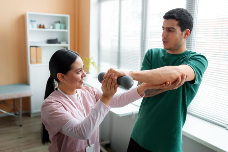 Physiotherapist guiding a patient through balance exercises