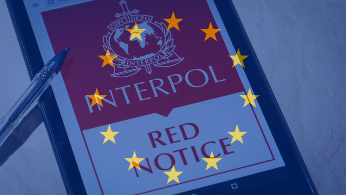 INTERPOL Red Notice with EU flag over the top