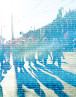 People on street with numbers in front