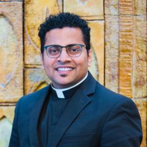 Father Praveen Lakkisetti