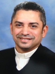 Father Carlos Martinez