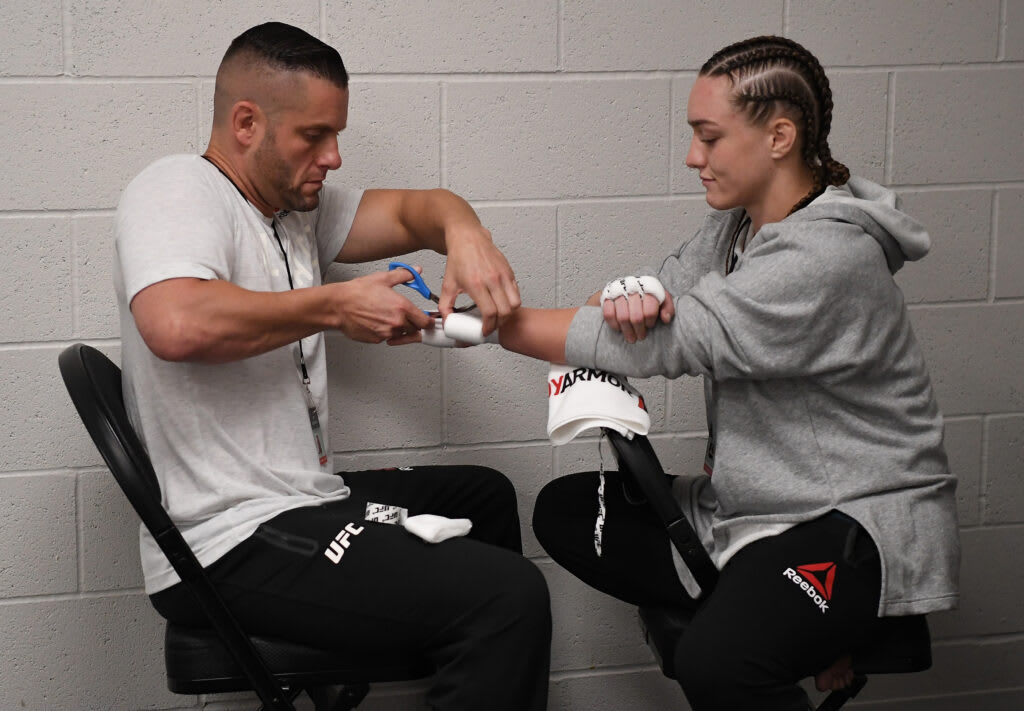 Aspen Ladd has her hands wrapped prior to her bout with Germaine de Randamie