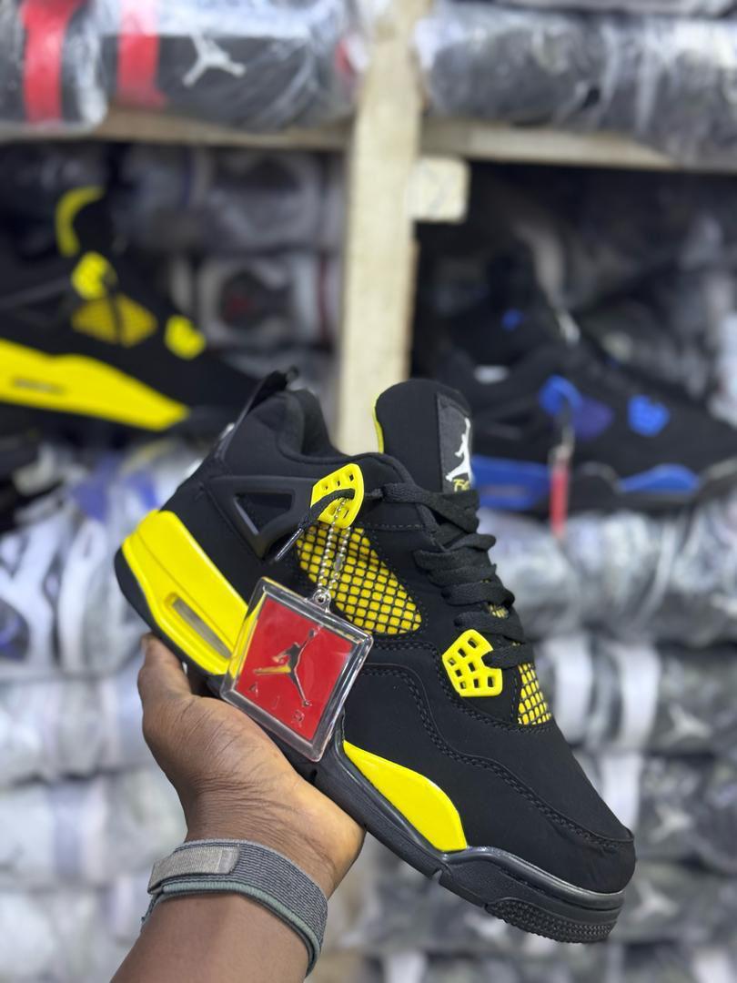 Air Jordan 4 Retro “Thunder” – Black & Yellow