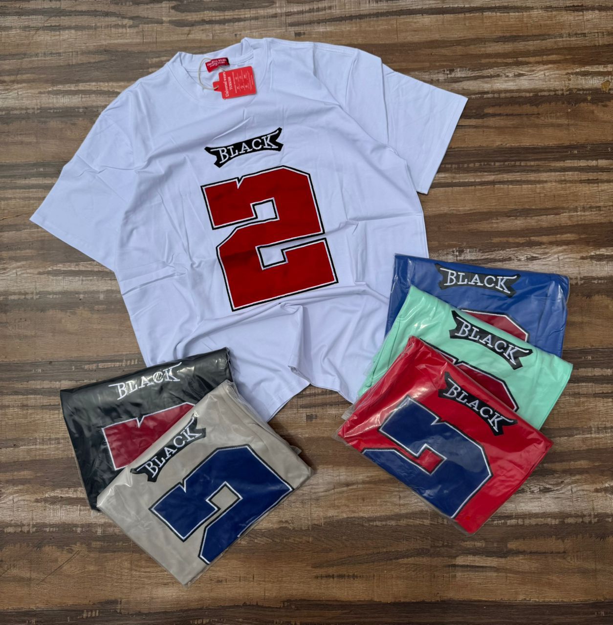 Random Designer T-Shirt with Large Red Number and "Black" Embroidery