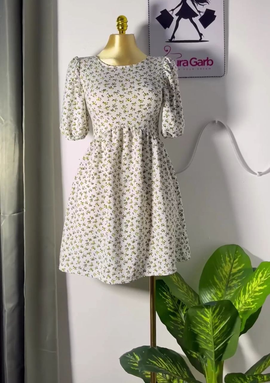 Elegant White Dress with Small Floral Pattern and Puff Sleeves