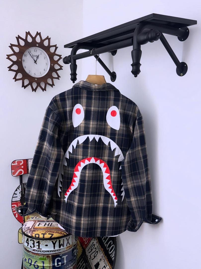 Stylish Black Plaid Flannel Shirt with Embroidered Patch 1