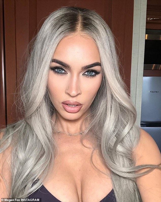 Megan Fox swapped her raven locks for silver hair this week. The Jennifer's Body actress, 35, posted a headshot where she was wearing the new color as she flashed her cleavage in a black bra