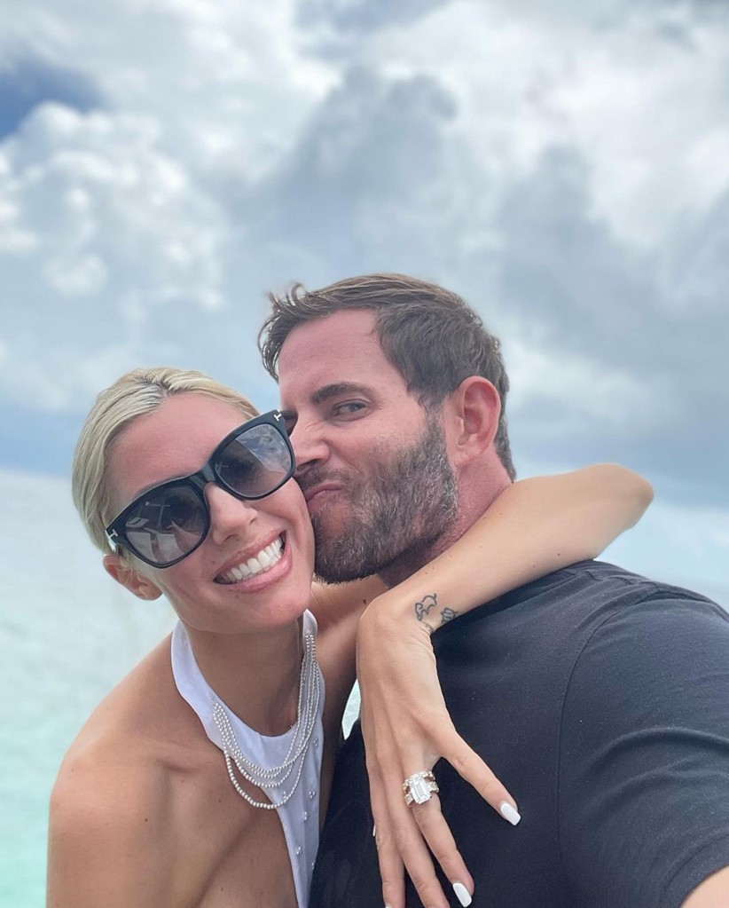 heather rae young tarek el moussa - The newlyweds shared a smooch in the Maldives.