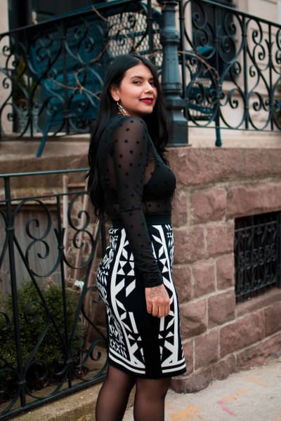 Mesh star top with black and white skirt.