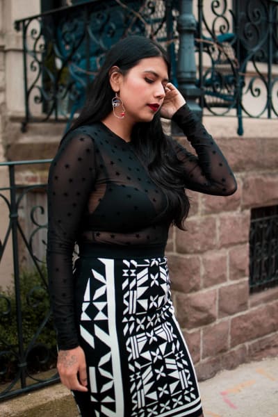 Mesh star top with black and white skirt.