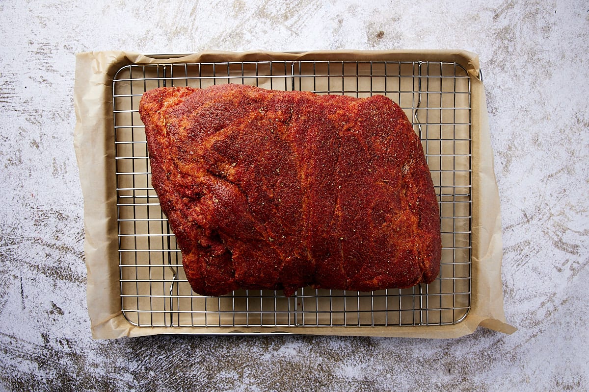 Sprinkle rub on pork butt