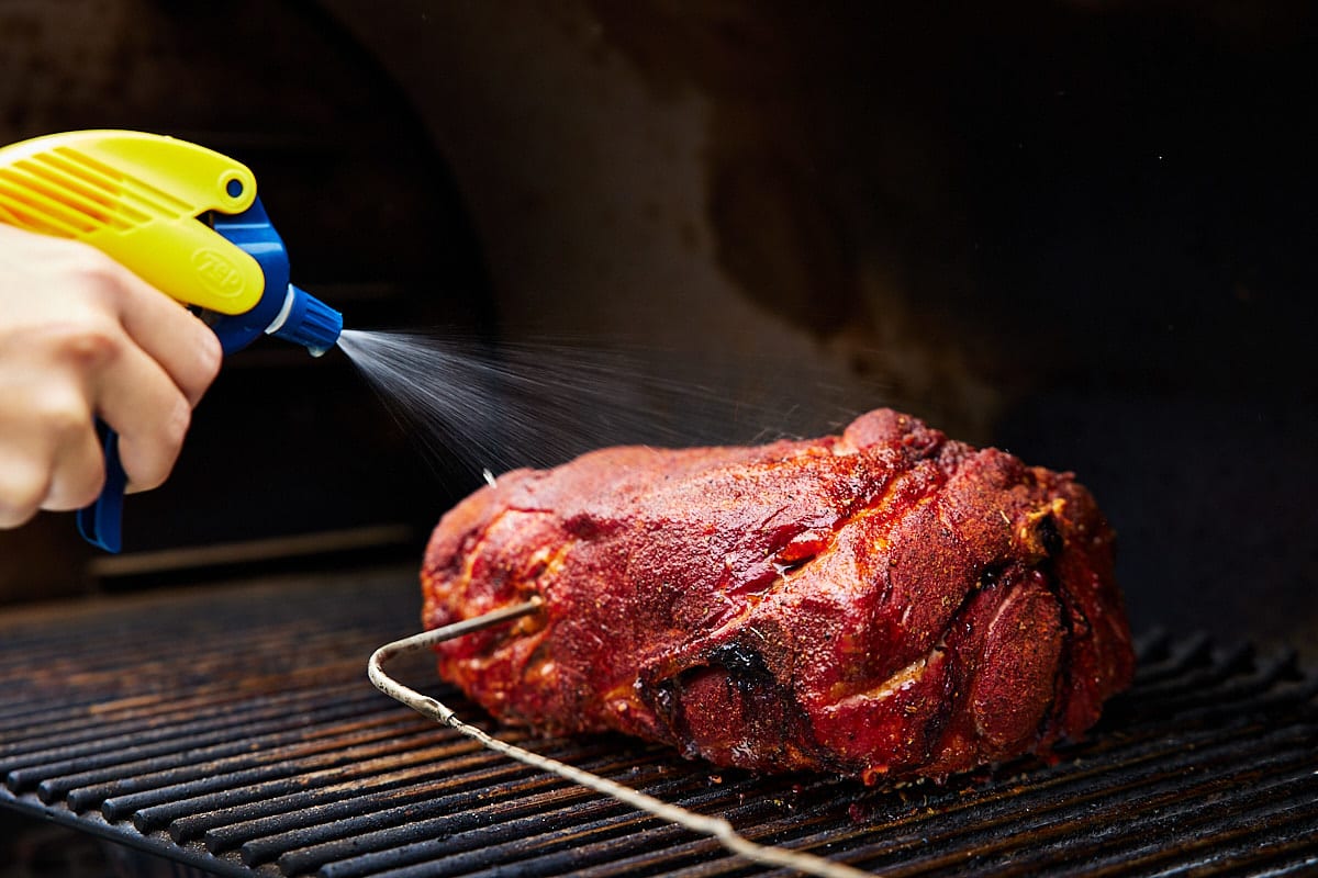 Spritz smoked pork butt every hour