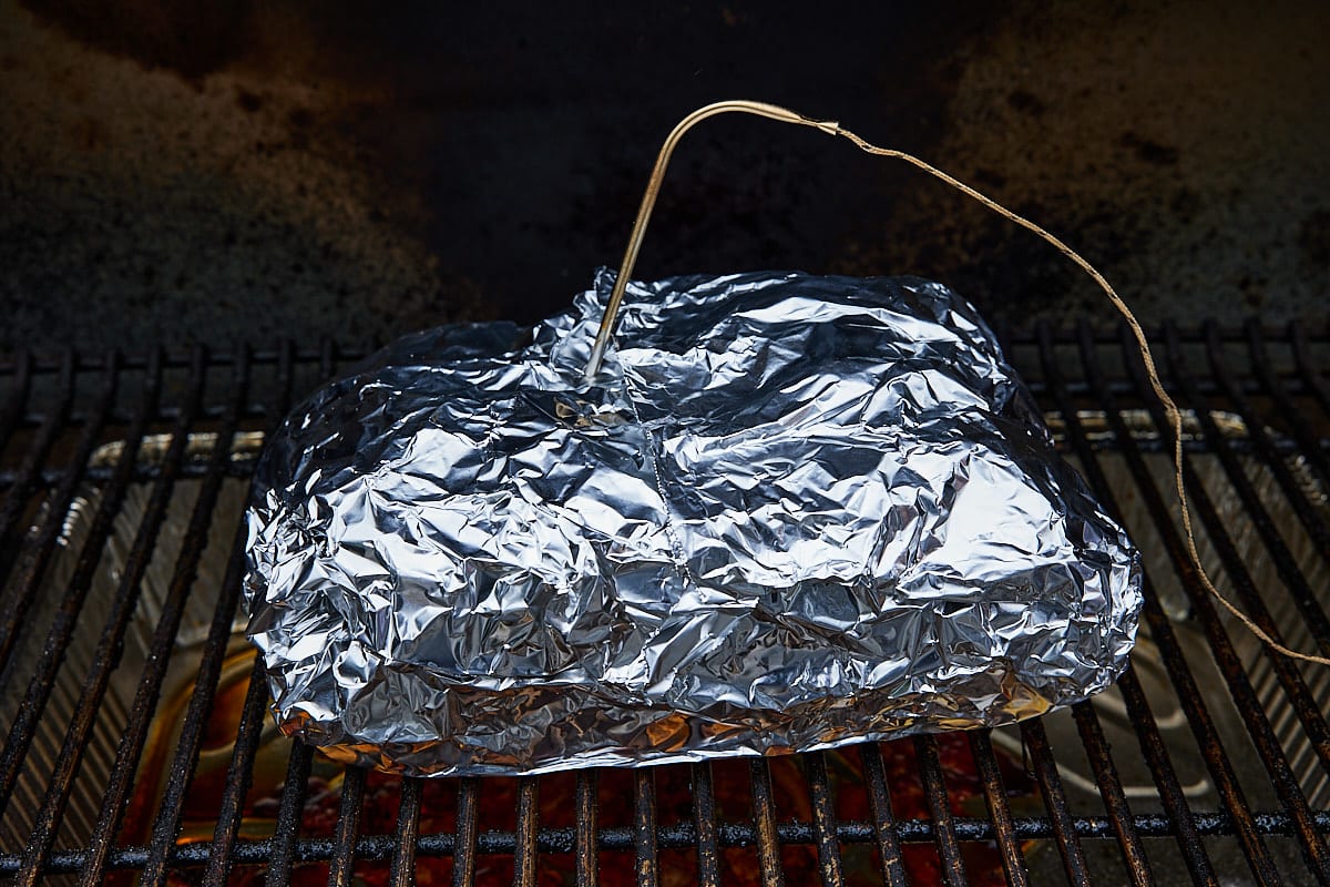 Place foiled wrapped smoked pork butt on the smoker