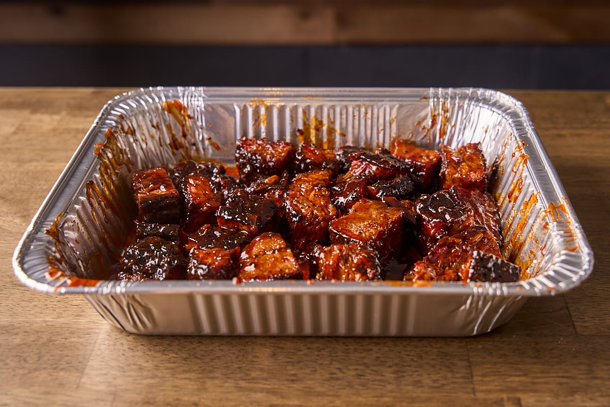 Toss the poor man's burnt ends and coat evenly