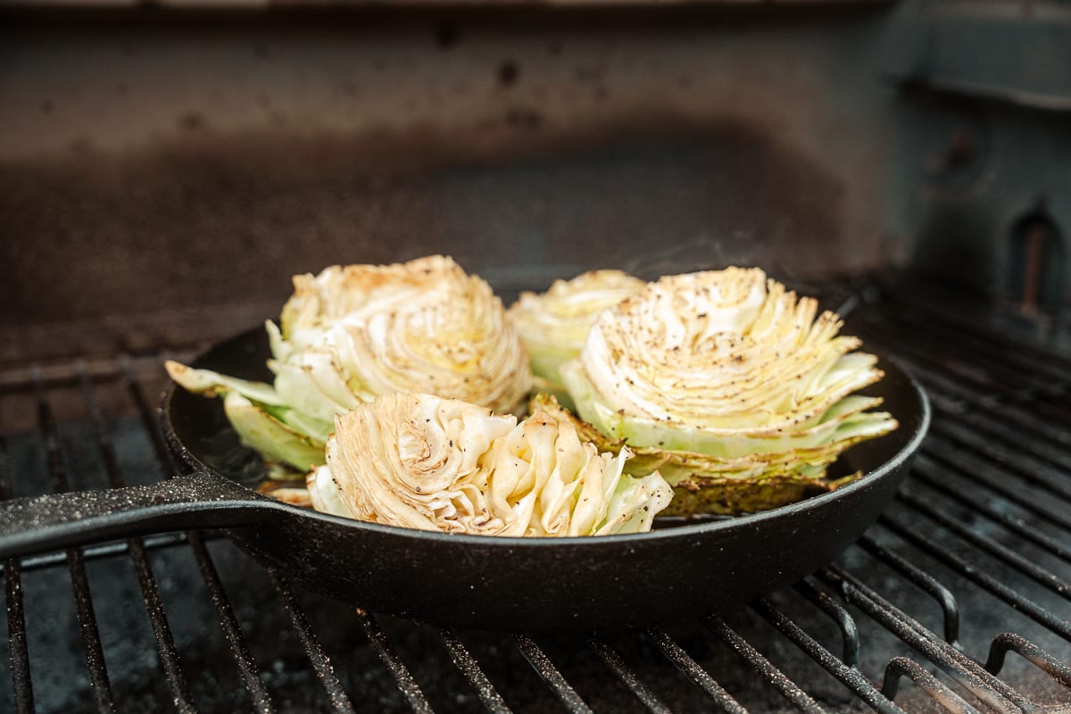 Smoked cabbage braising in a smoker