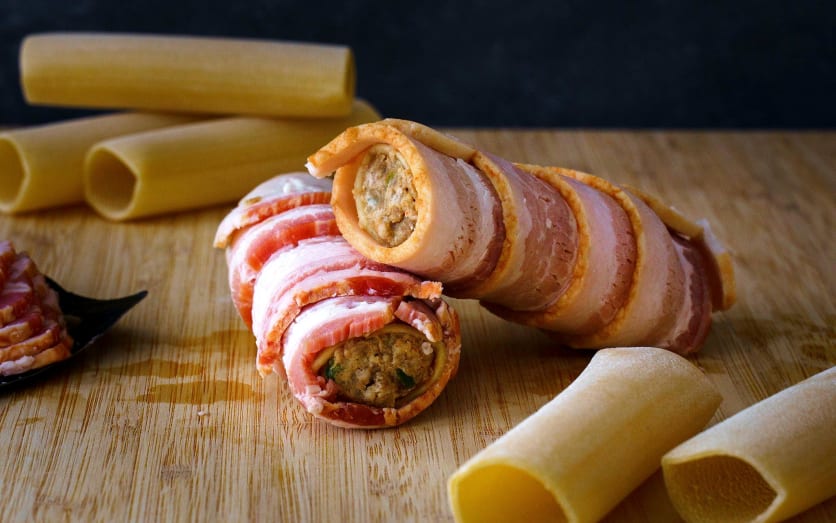 Smoked shotgun shells prepped and wrapped in bacon