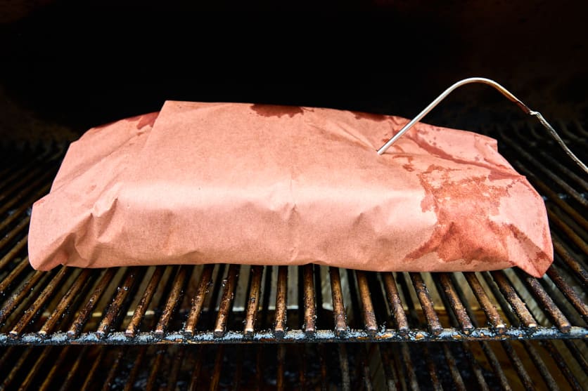 Smoked Brisket smoking in butcher paper