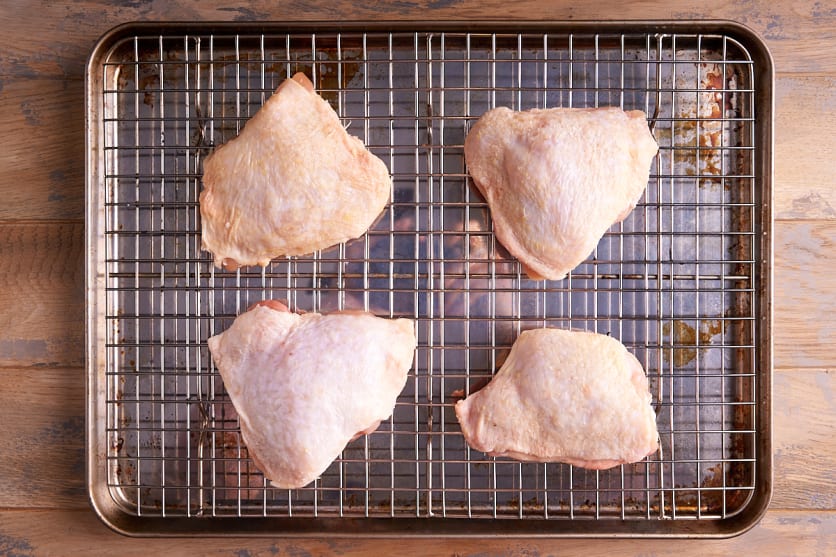 Air dry the chicken thighs
