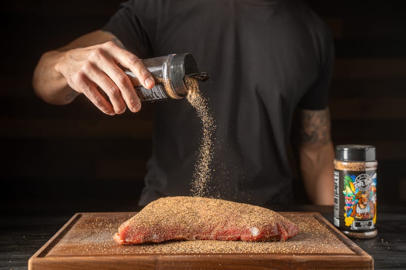 Season the tri-tip roast on all sides with BBQ seasoning