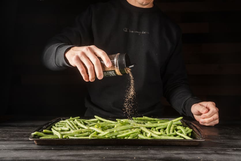 Sprinkle seasoning over the green beans