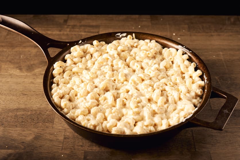 Put the remaining pasta mixture on top of the cheese