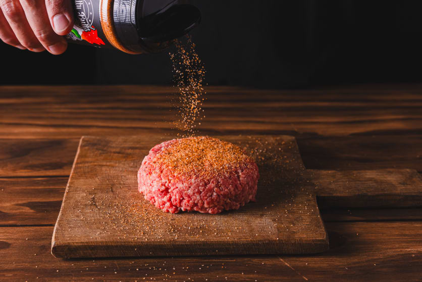 Form the ground beef into 4 equal size patties and season