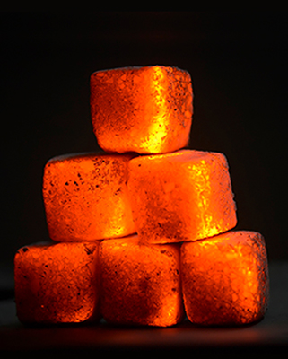 coconut charcoal briquettes cube-shaped burned