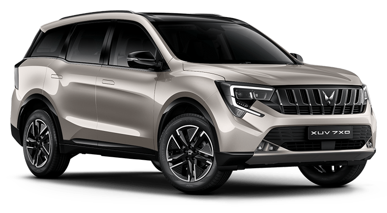 Mahindra XUV 7XO in Desert Myst with a black roof, front three-quarter view