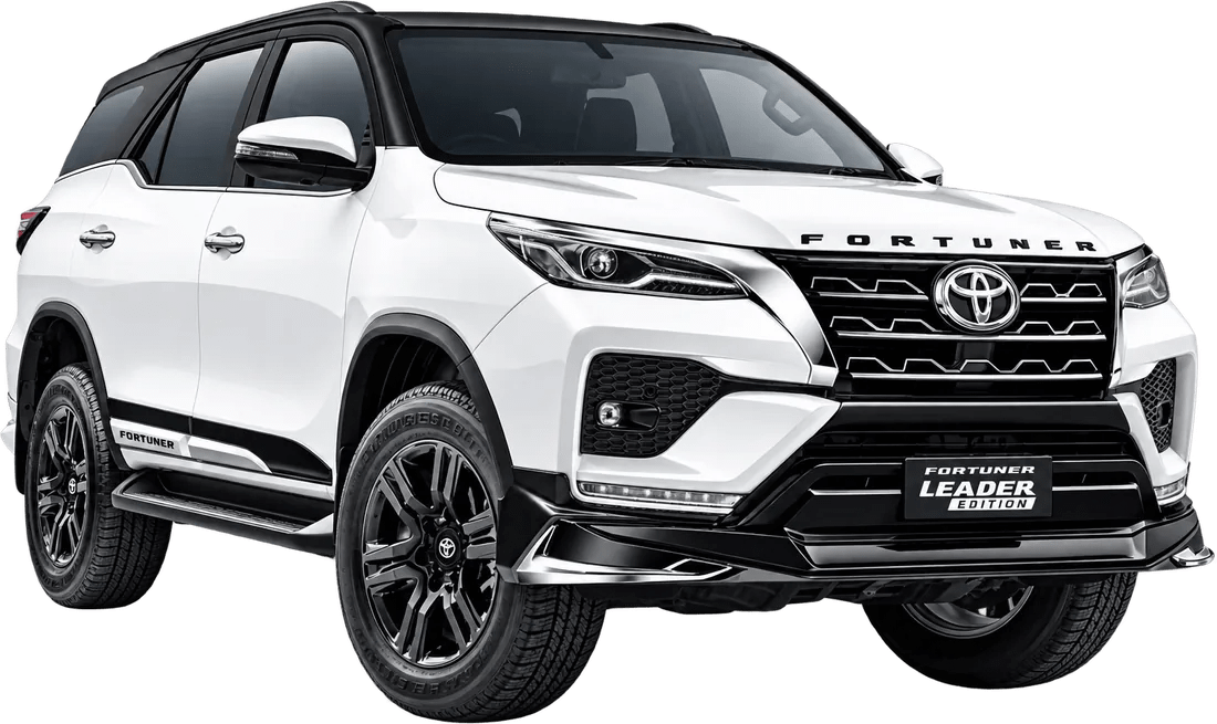 Toyota Fortuner Leader Edition in white with a black roof, front three-quarter view