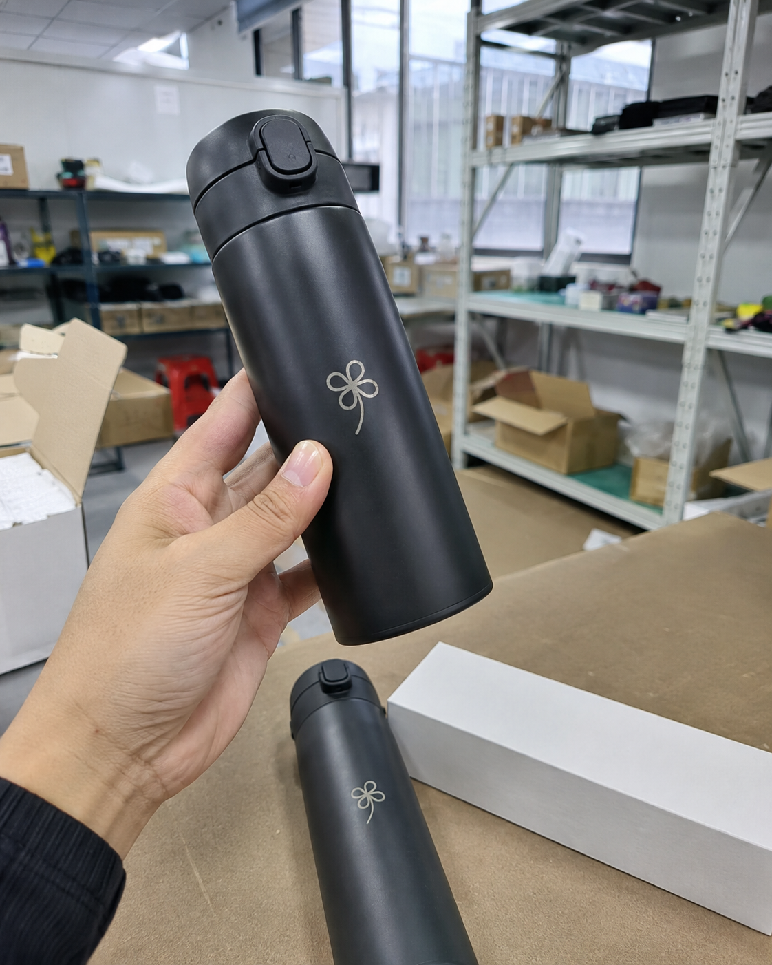 A branded sample held up for approval