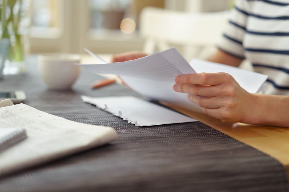 https://res.cloudinary.com/fbrcloudinary/image/upload/q_auto/v1/cms/post-featured-images/Woman_Reading_Document.jpg