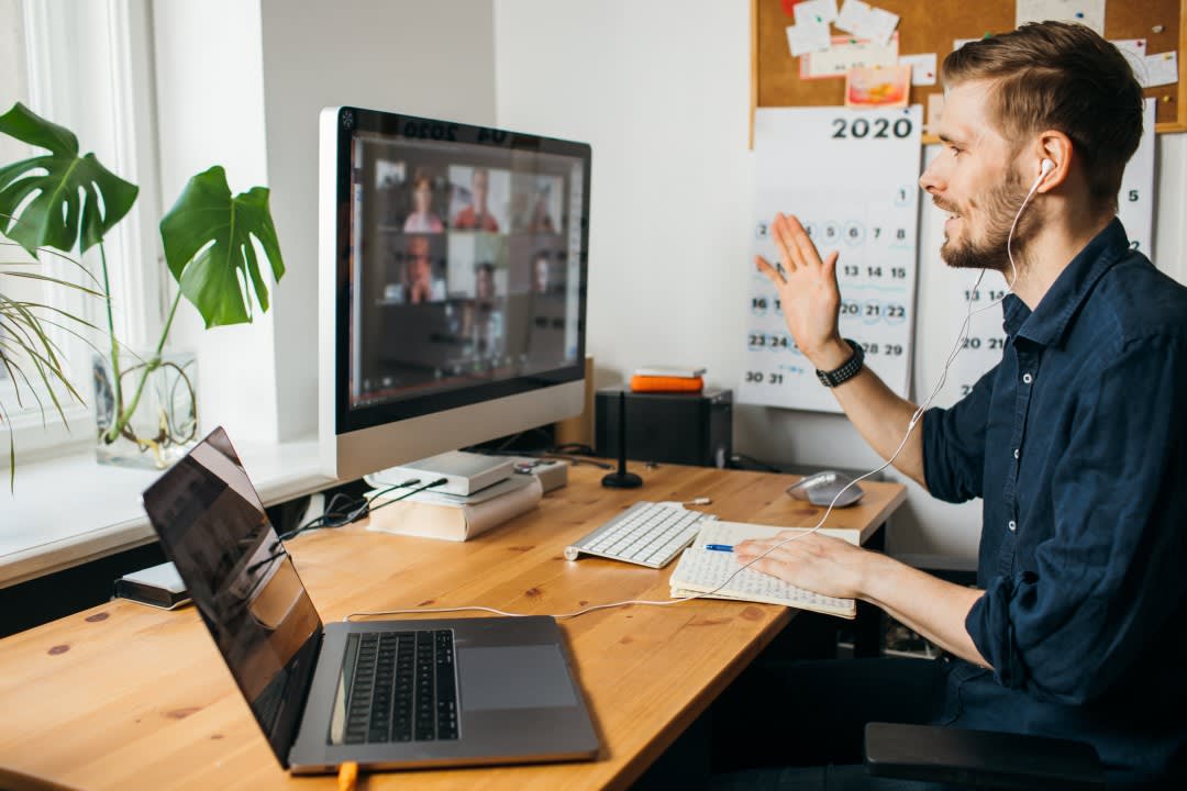Man attending virtual event online