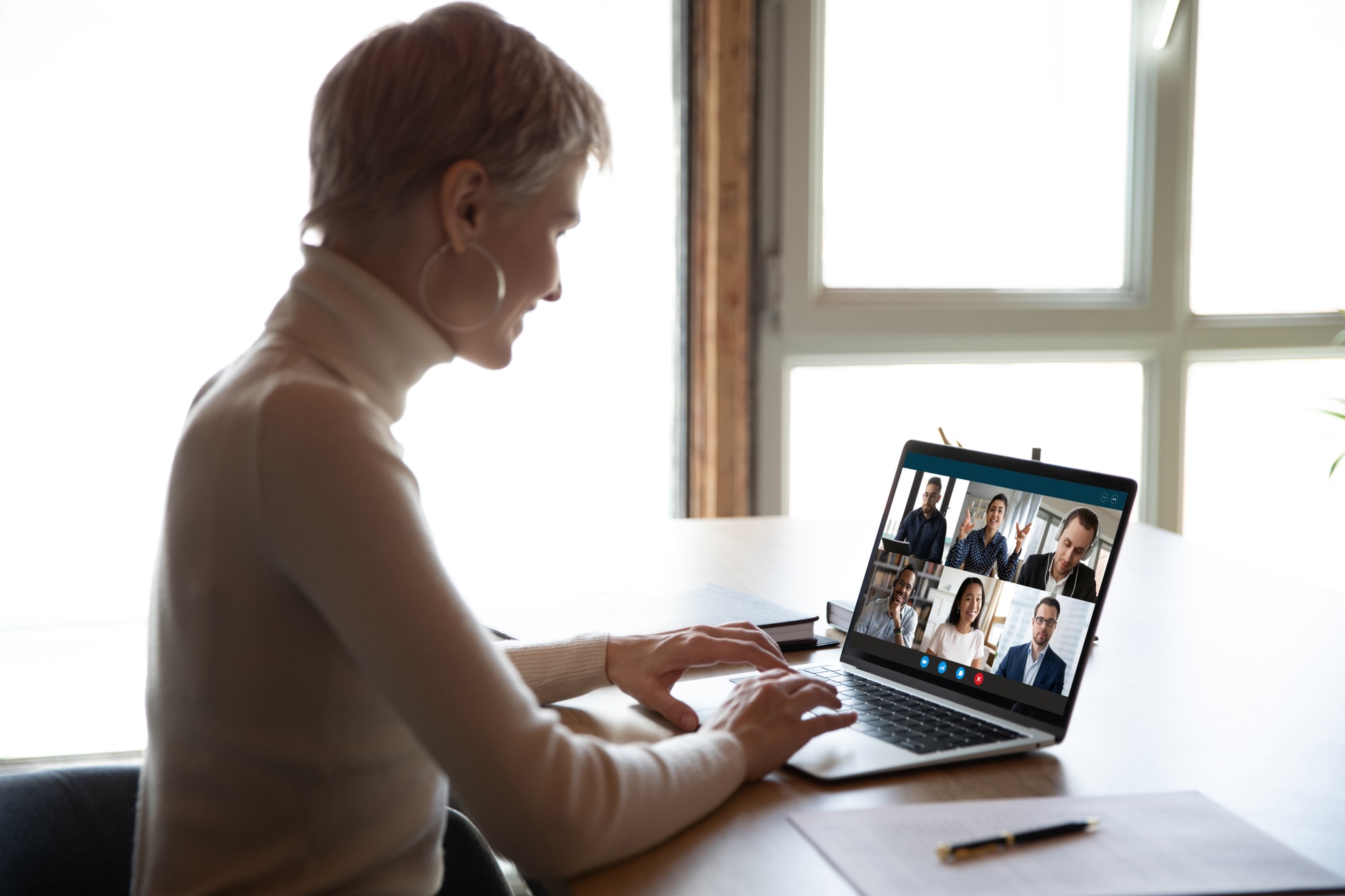 Depositphotos_359339828_l-2015_1848495f7a Woman on video call with colleagues