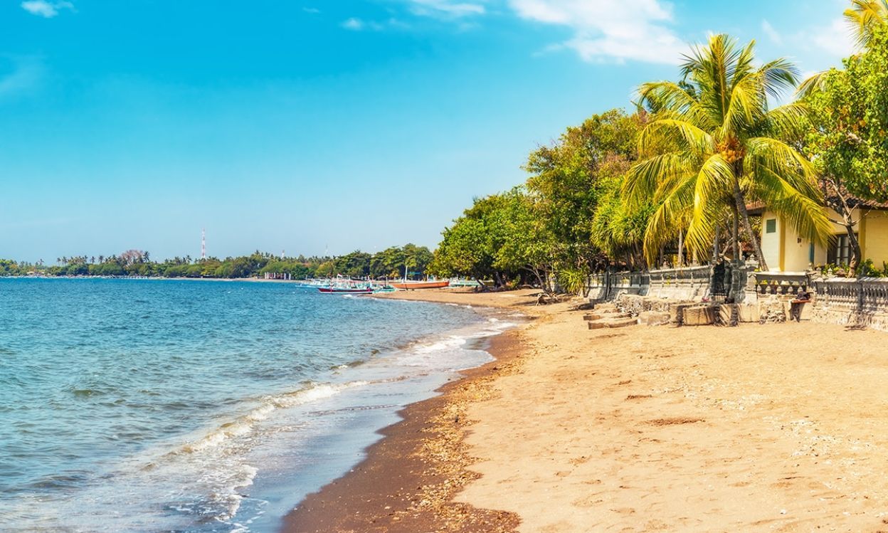 Visit Lovina Beach with black sand at north coastline