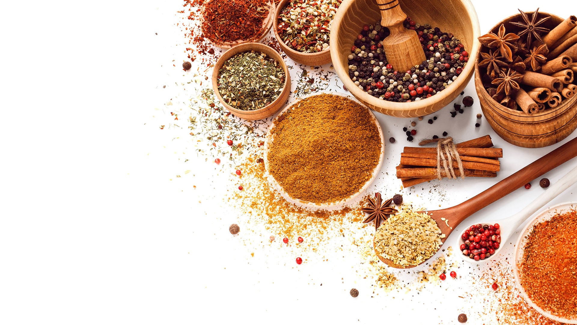 Illustrative bowls of herbs and spices for the seasoning range