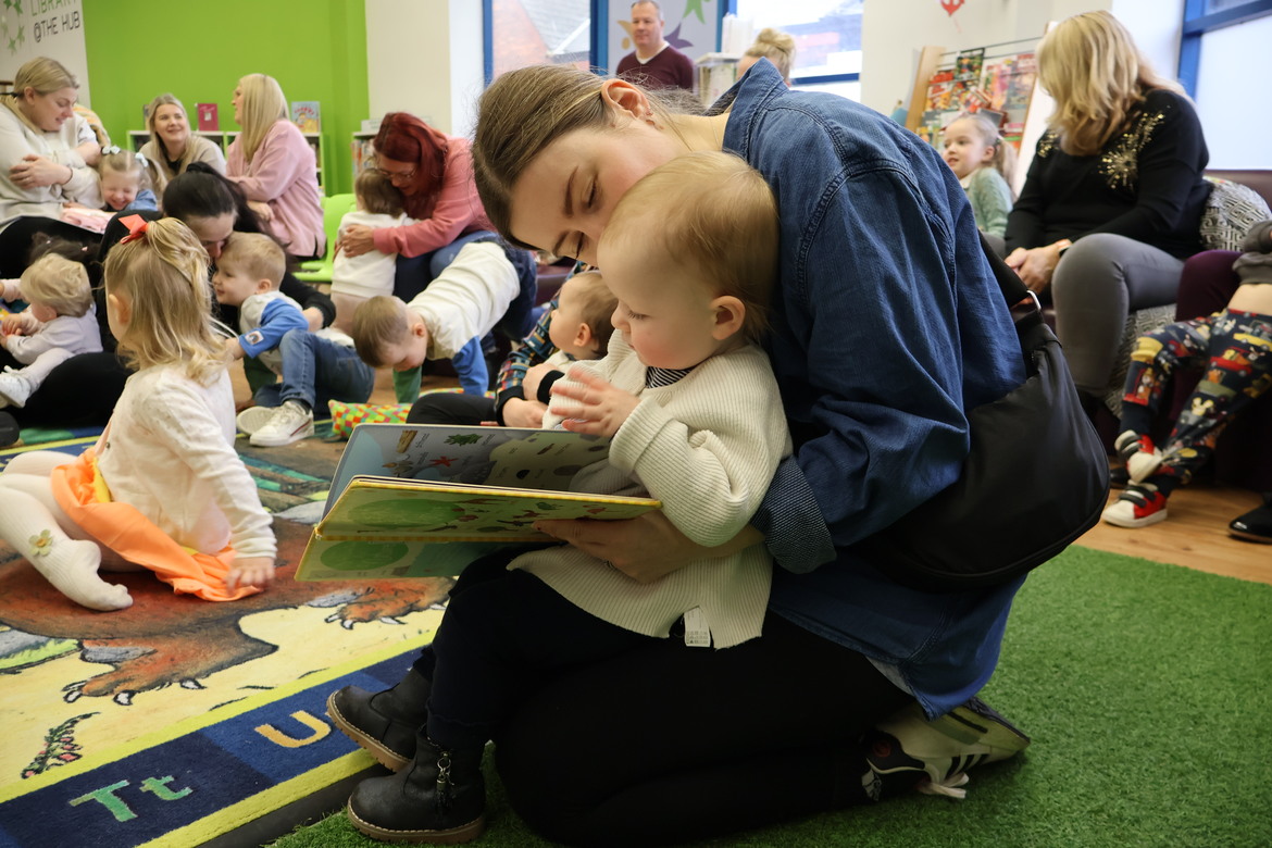Children enjoying a library story and rhyme session