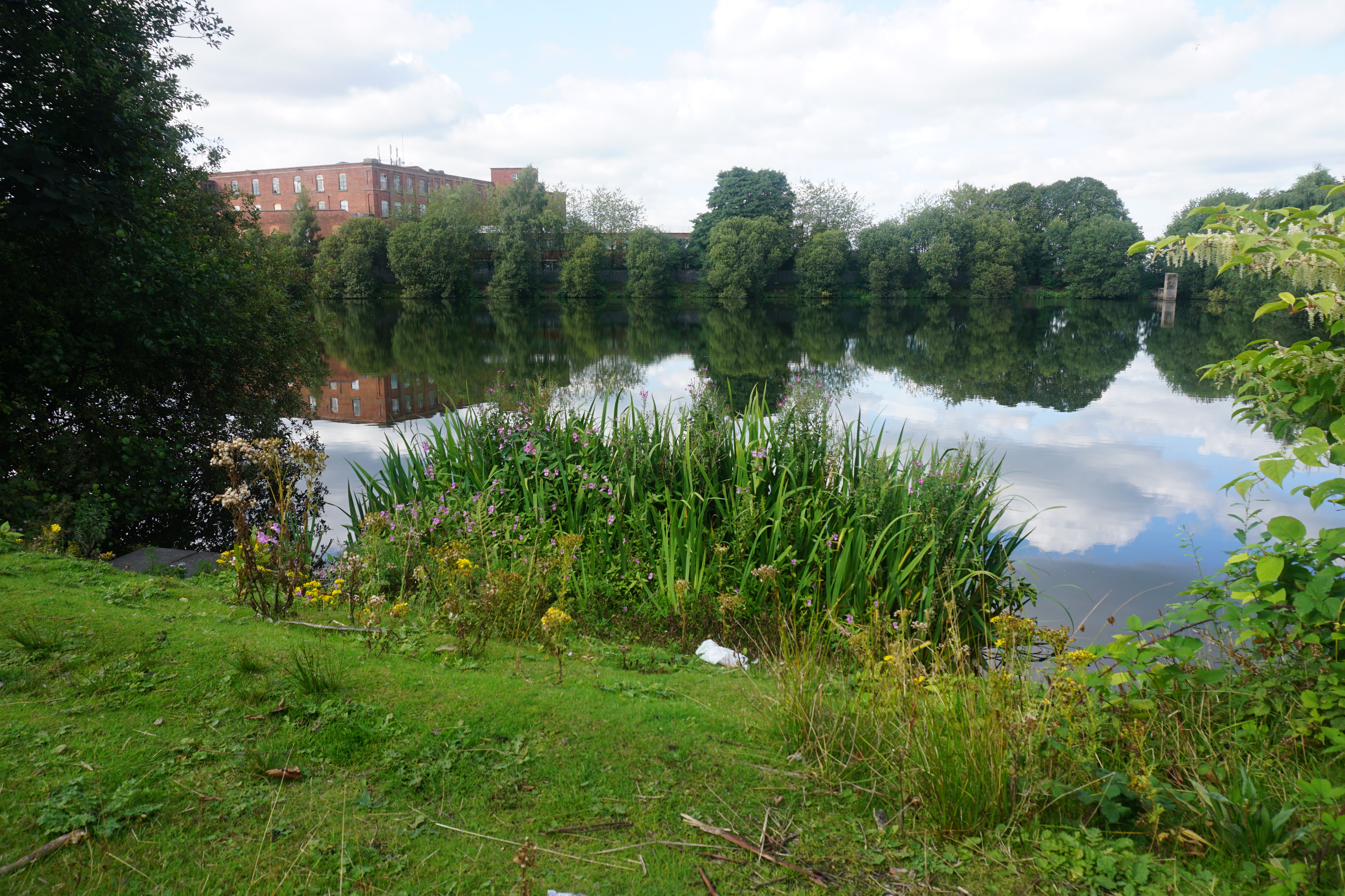 Bradford Reservoir in Great Lever, Bolton, used as a representative local-area image for the Community Shop Sunnyside story; it does not depict the shop.