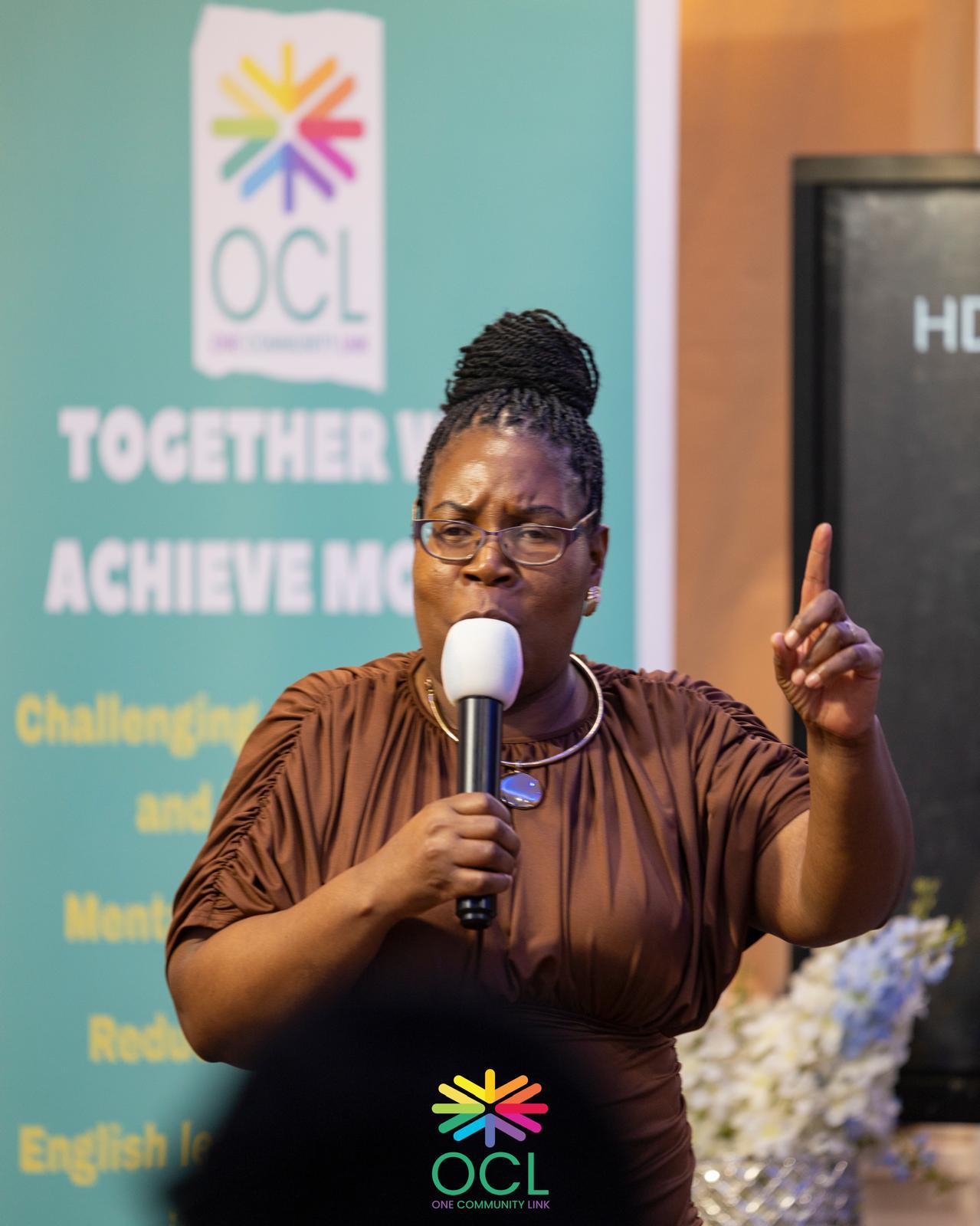 One Community Link founder and CEO Euphrasia Makaure speaking at an OCL event.