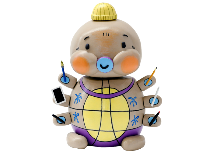 A colourful Animex turtle character holding creative tools