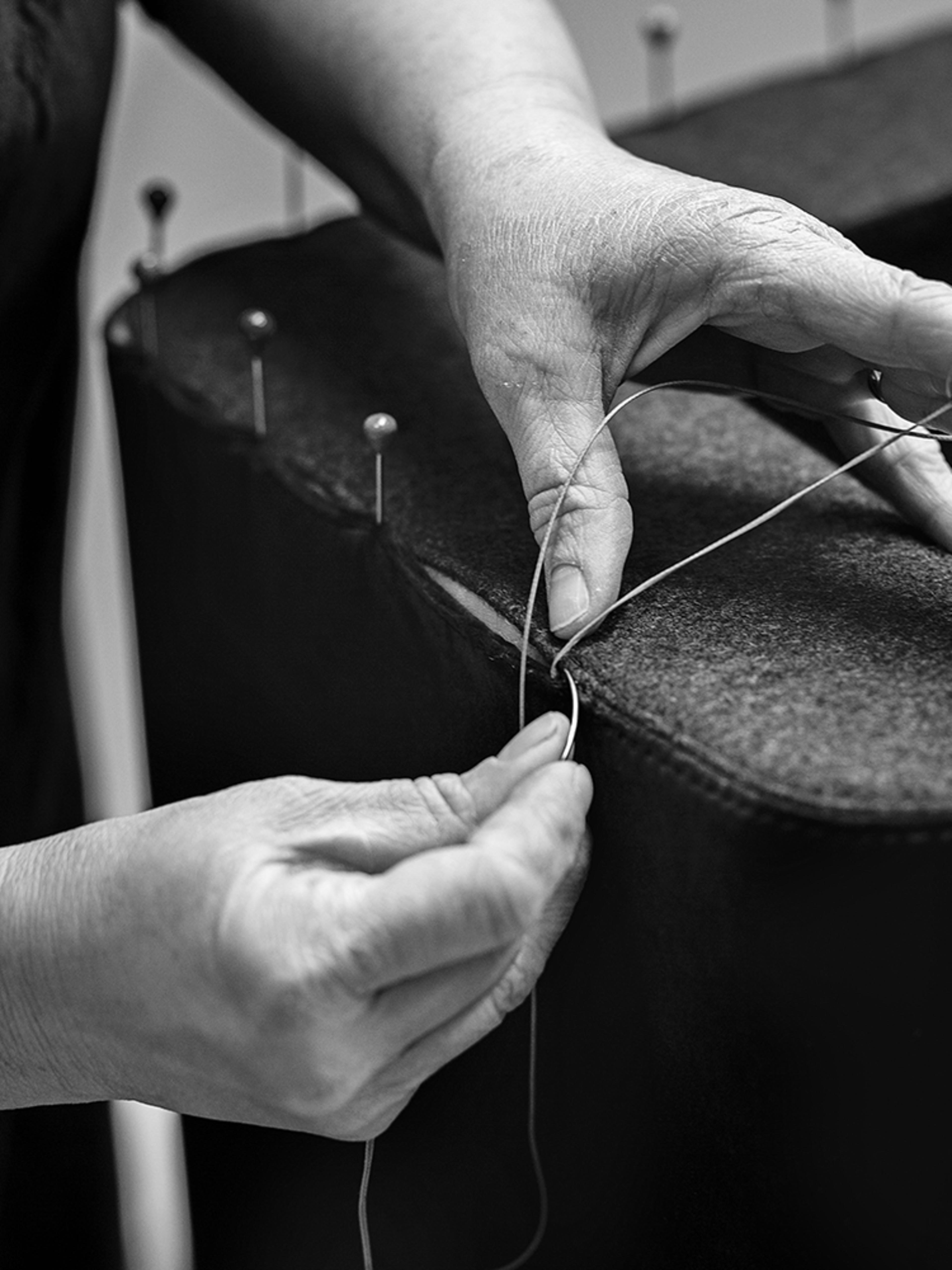 Local upholstery of a sofa at Fredericia Furniture production