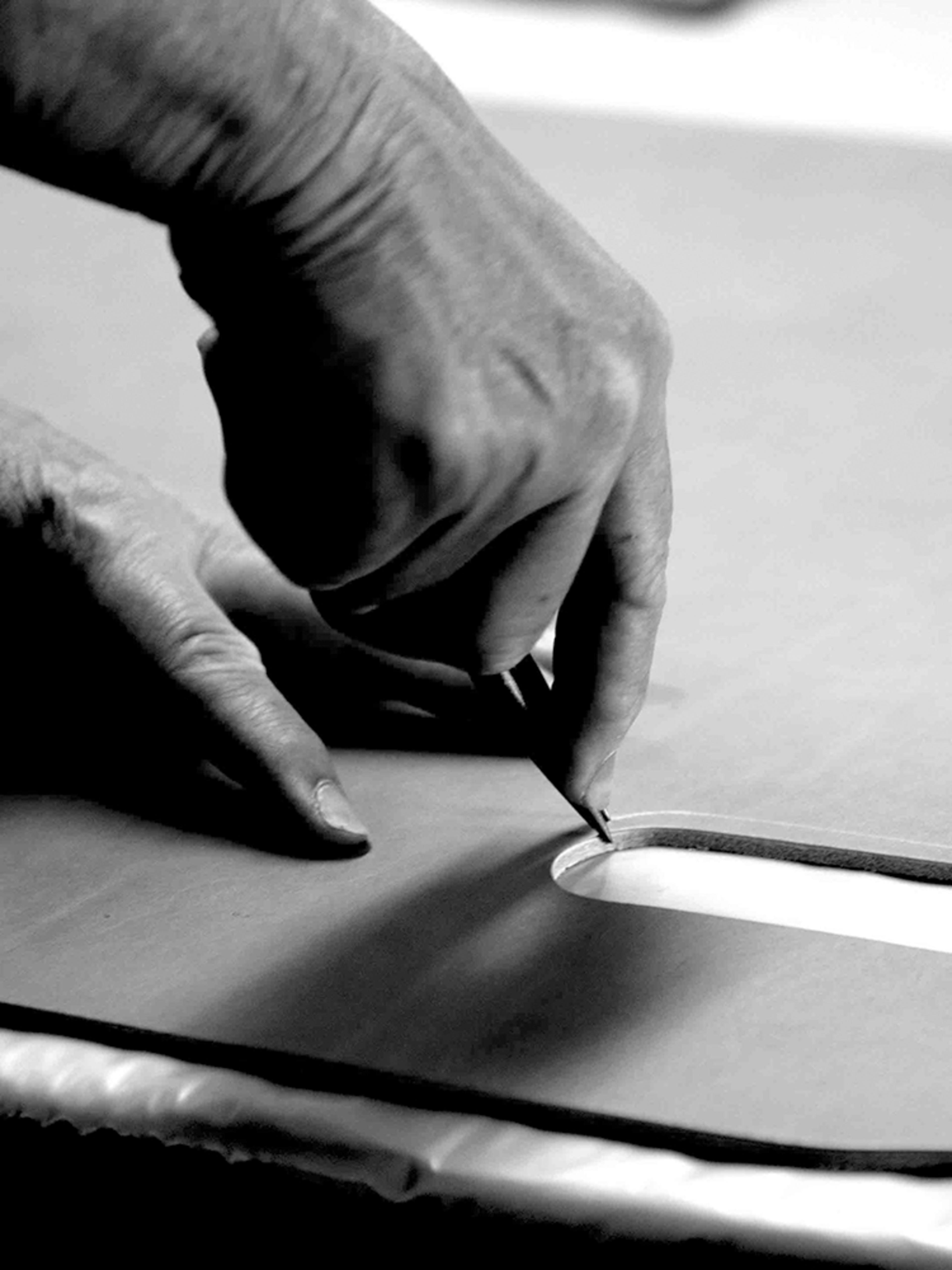 Cutting leather at Fredericia Furniture production